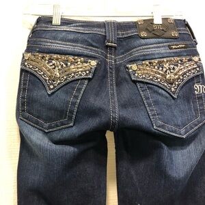 Miss Me Jeans with back pocket detail.
